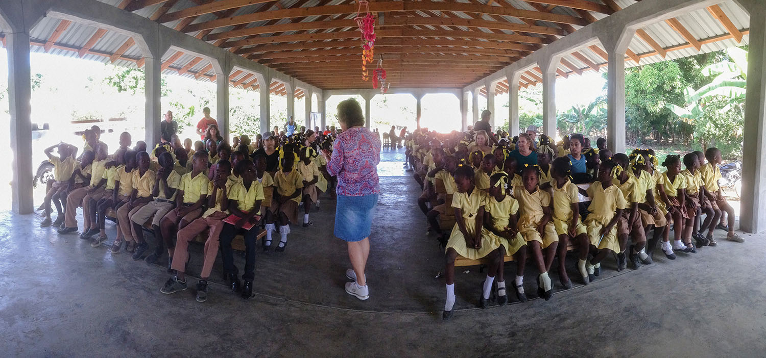 Jeanne DeTellis encouraged our students from Bire, Haiti, prior to receiving their shoebox gifts.