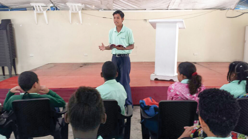 Ninth grader, Duandry Arrechedera Martínez, shared during chapel service in Bombita, Dominican Republic.