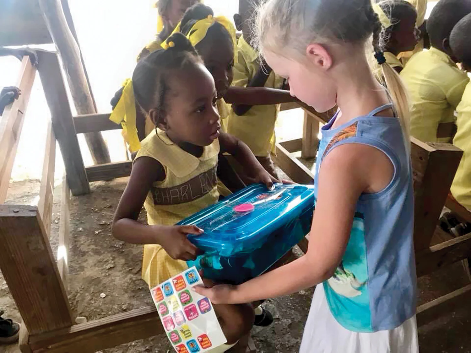Lilah, at the age of ten, helped deliver shoeboxes to our schools.