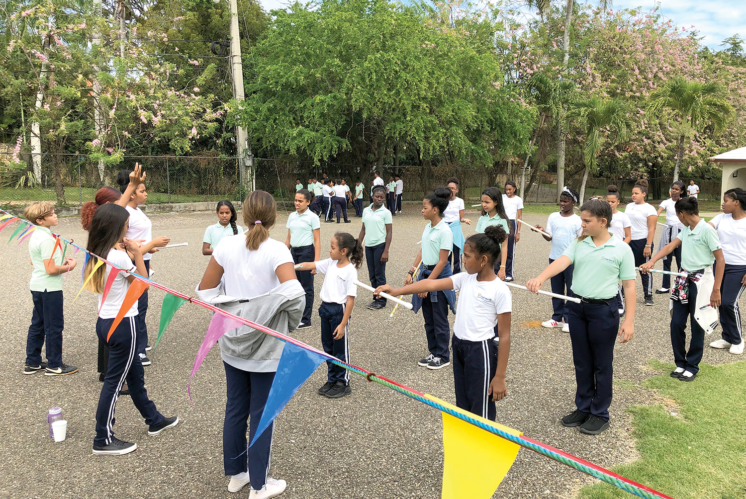 Experienced students learn leadership skills as they lead and direct new students who participate in the annual parade. As students practice marches during the month of February, they learn more about loving and respecting their country.