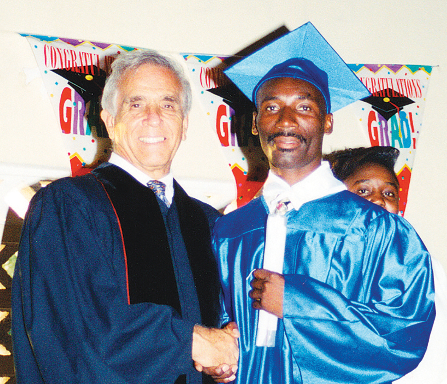 Pastor George DeTellis, Sr. with Pastor Joseph Elite Eliane (now pastor in Ti-Boucan, Haiti) on graduation day in the year 2000.