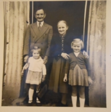 In Germany: Eva (on the right) with her younger sister and her aunt and uncle