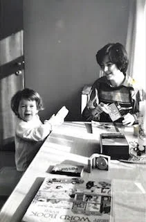 My Communist Kitchen: I am studying Polish with my notebook and tape recorder, and my little girl is studying English with her Richard Scarry dictionary.