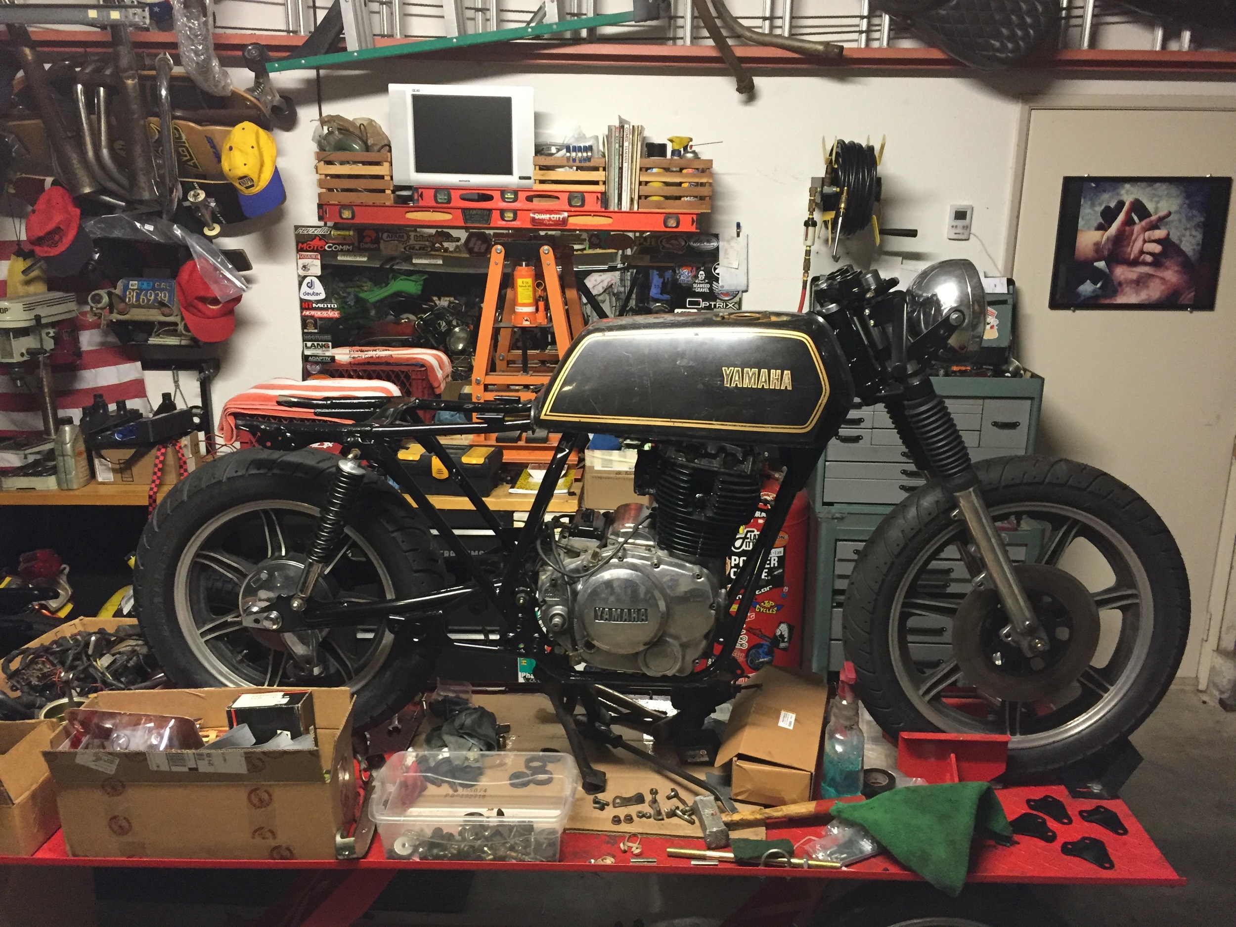 I found this TX/XS 500 tank on eBay for cheap. It helped me confirm that I wanted a square tank instead of the teardrop style that the bike came with. This one, however, needed a repaint and would need some custom mounting brackets. Back to eBay to search for something that would work out of the box.