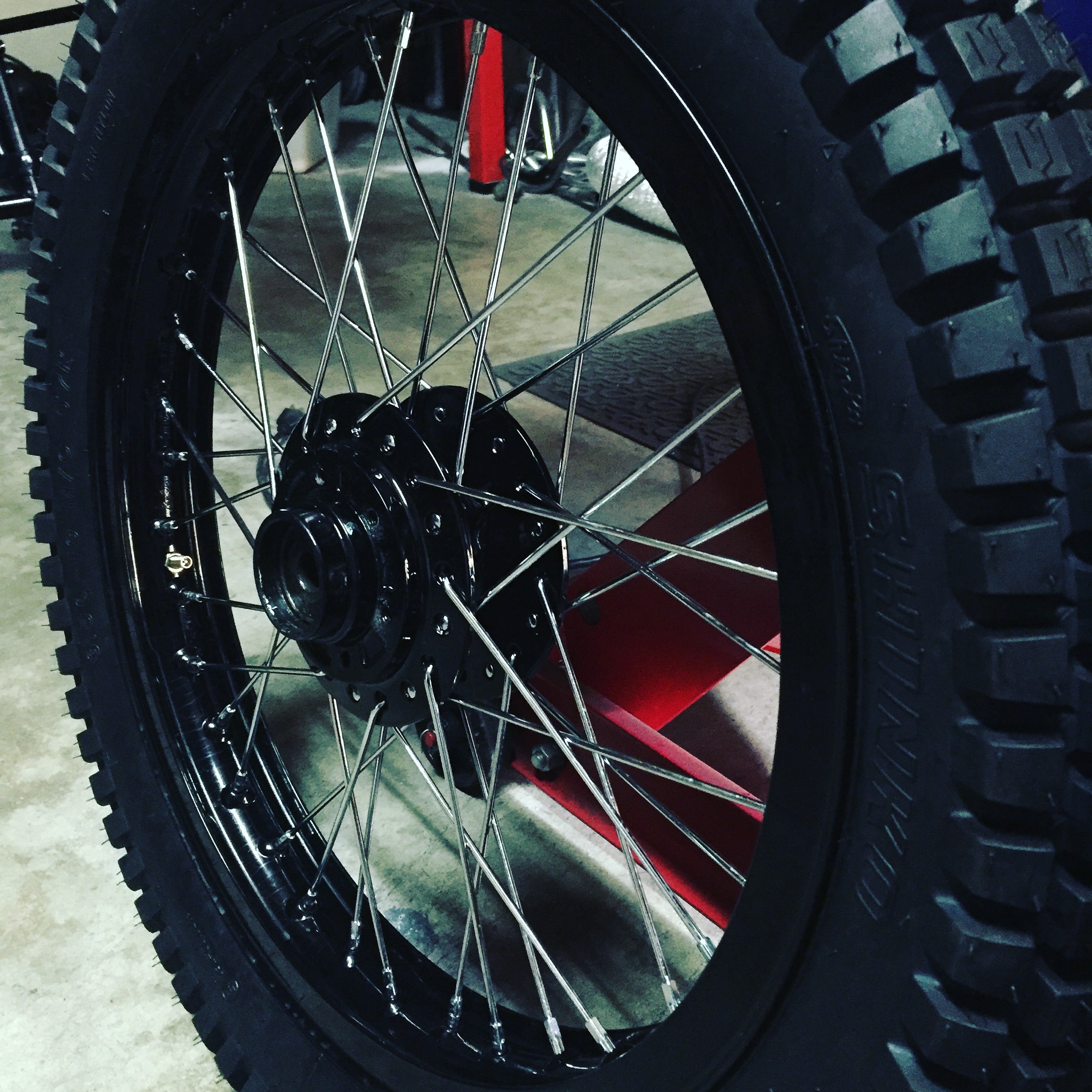  Our "go to" combination. &nbsp;Gloss black powder coated wheels and hubs with chrome spokes. &nbsp;We've done it before, and we'll surely do it again. &nbsp;This XS650 is going to look killer with   trials tires  ! 