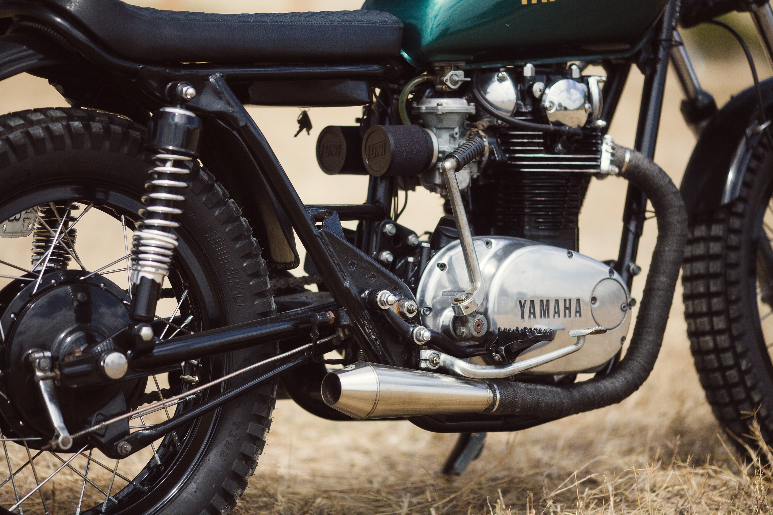 We ran the UNI Pod Filters on this bike because we knew it would be kicking up some dust!