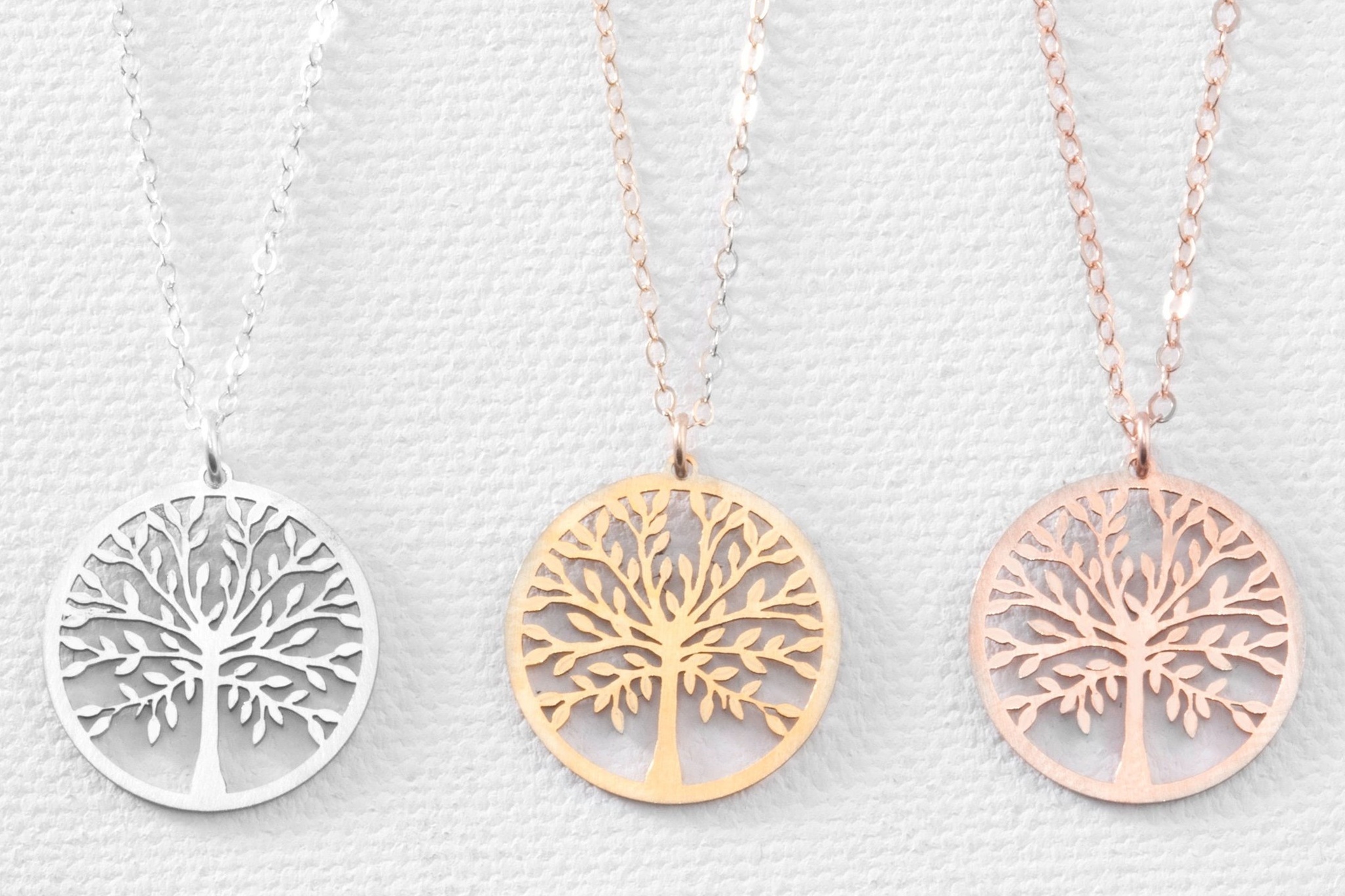  There are quite a few lovely choices on Etsy with Tree of Life designs, like this necklace, that are sure to appeal to the family history fan in your life. Search lapel pins, too! 