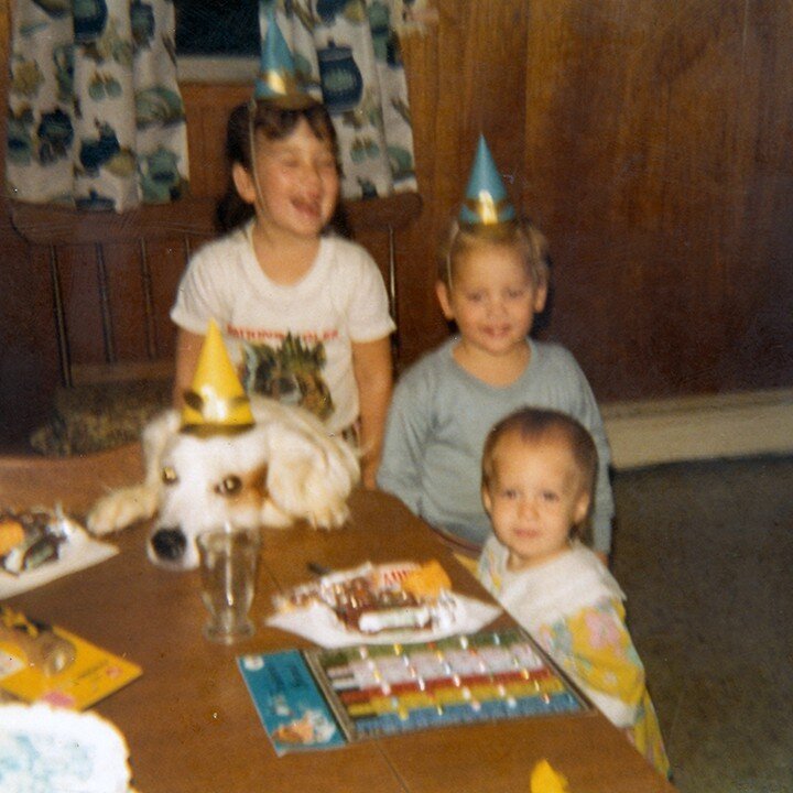 An instance when a slightly blurry photo is worth keeping! The littlest one here is me, while my two older cousins and my grandparents' dog, Shep, don dime store birthday hats behind me. This snapshot makes me feel, it makes me remember, it makes me 