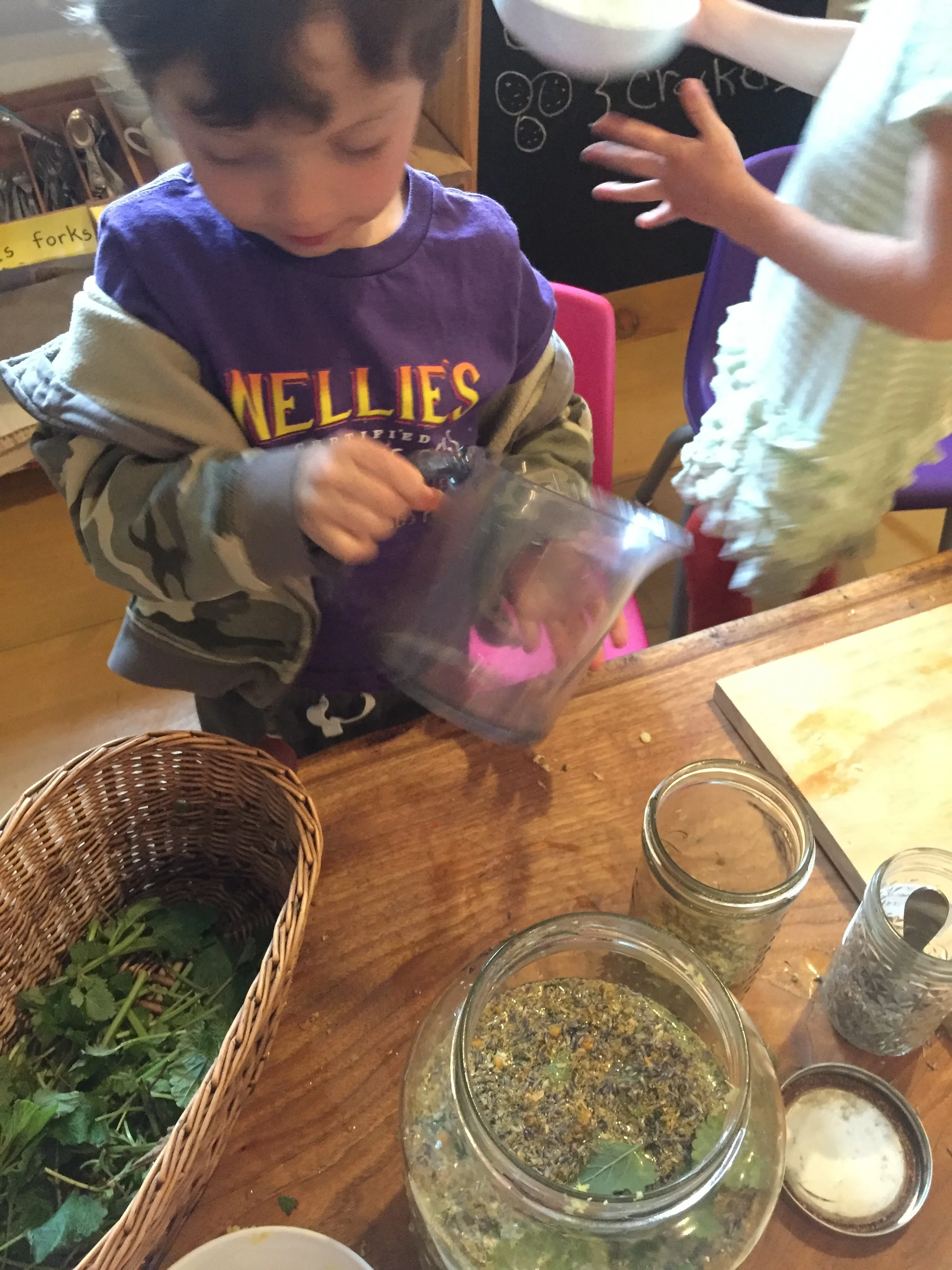 Making happy potion with some of our harvested lemon balm