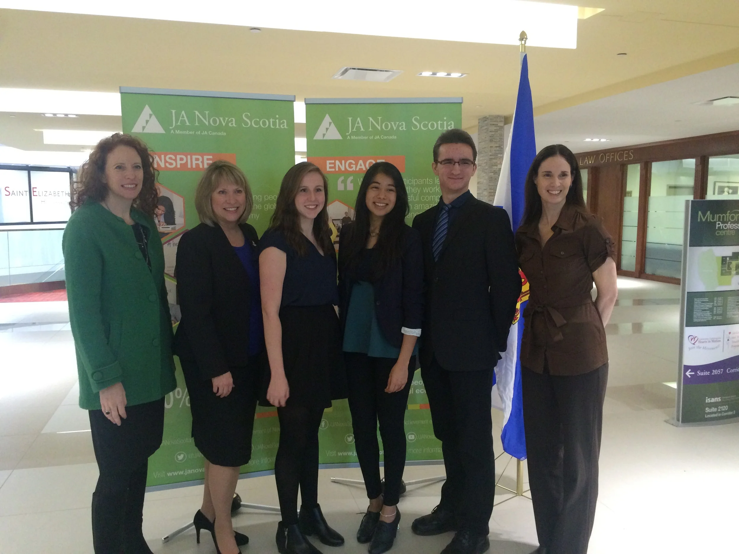 Left to right: Wendy Brookhouse; Chair of JA Nova Scotia Board of Directors, Minister Kelly Regan, Lori Anthony; JA Alumni, Maria Fernanda Cano; JA Alumni, Connor Fullerton; JA Alumni and Kristin Williams, President & CEO of JA Nova Scotia