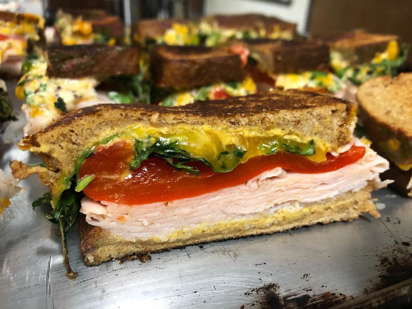 Made Turkey &amp; Cheddar Sandwiches at the 🔥🏚 last night. Smoked shaved turkey, pickled roasted red peppers, shredded cheddar cheese, arugala, &amp; Crema whole grain mustard sauce to the rescue as we had no idea what and little energy to cook. Th