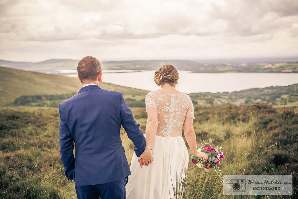 Newlyweds couple take a stroll at Glendalough Wicklow