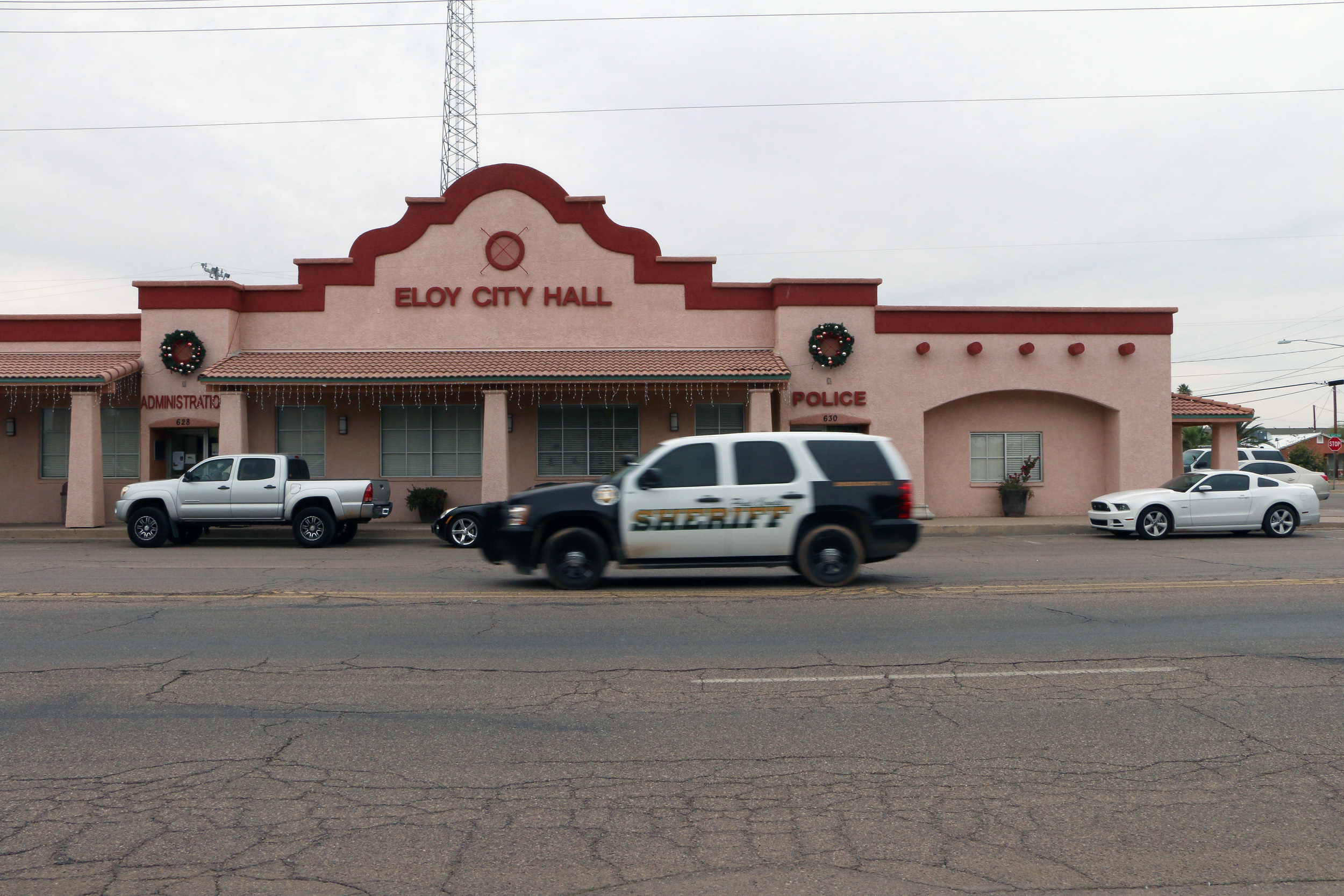 Eloy City Hall, the administration tasked with managing the new family detention center, 930 miles away in Dilley, Texas. This loophole is the first of its kind, allowing contracts and permits to be drawn up upon the existing authorizations, which Eloy has thanks due to the ICE facility it has operated since 2003.