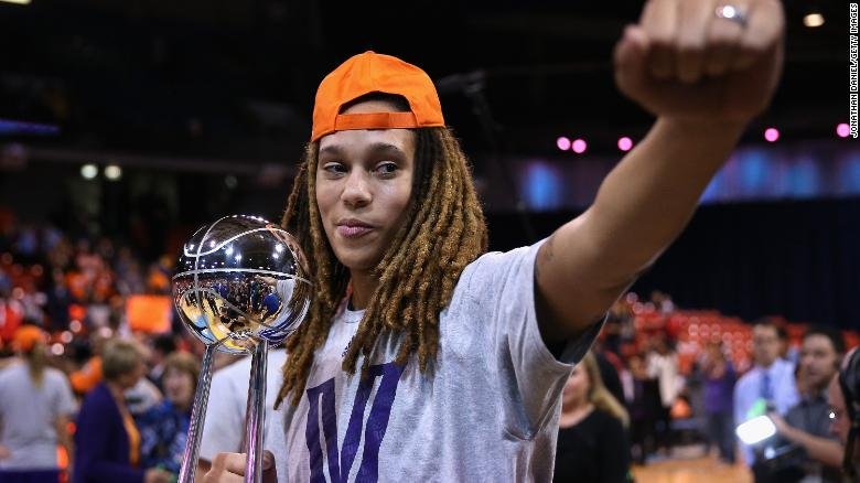  Griner holds the championship trophy after defeating the Chicago Sky in game 3 of the WNBA Finals in September 2014 in Chicago. 