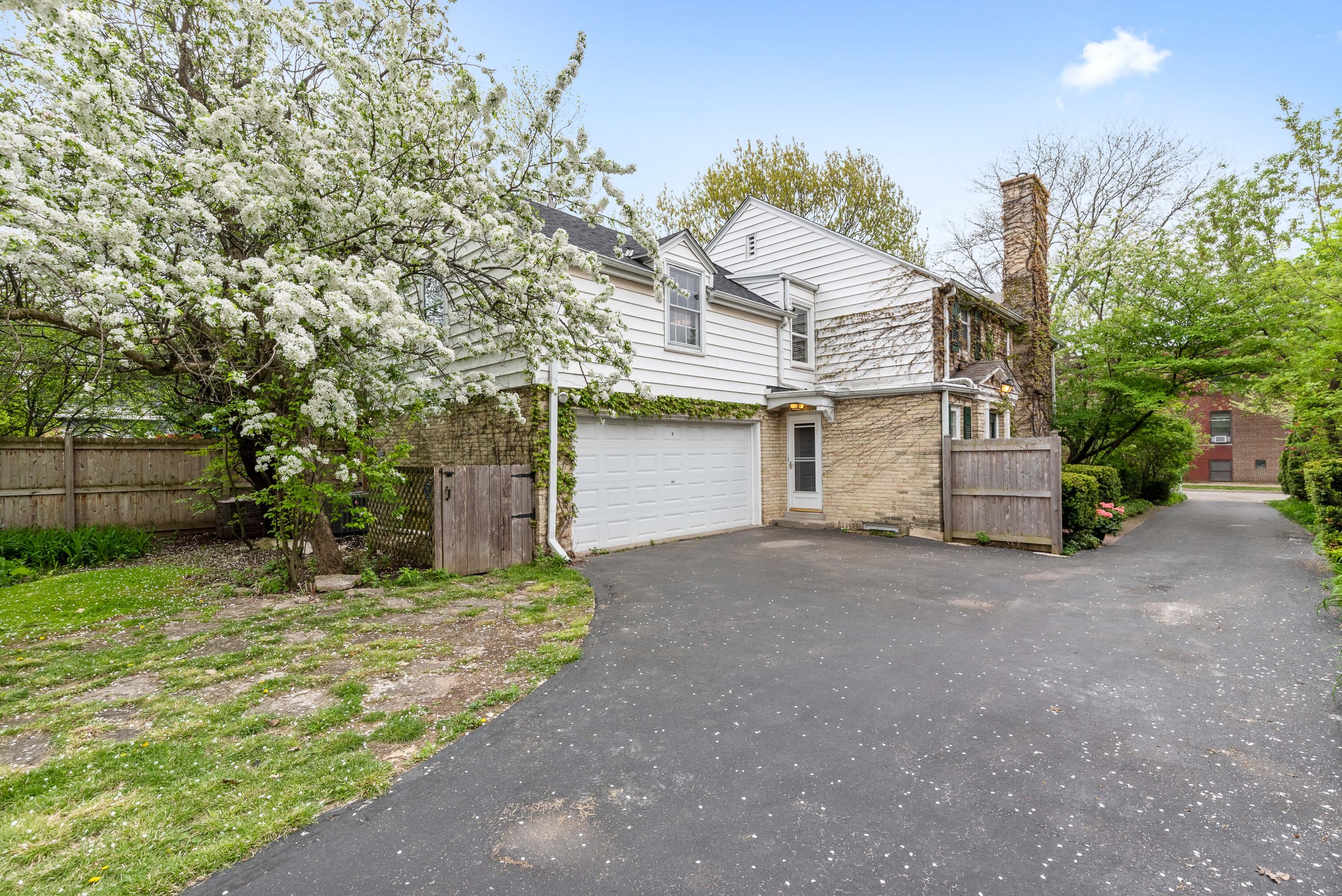 Side Driveway and 2 Car Garage