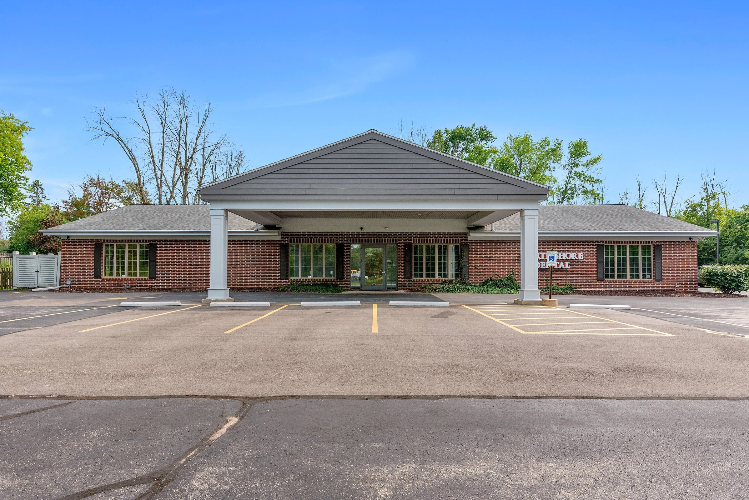 Front of Building with Parking Lot