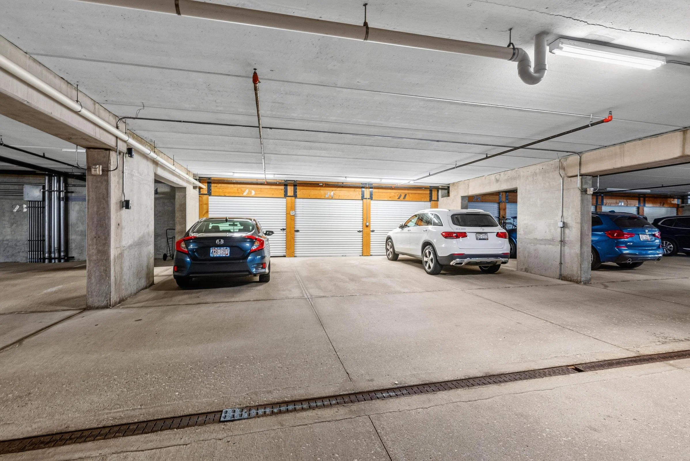 2-Indoor Heated Parking Spaces w/ Storage