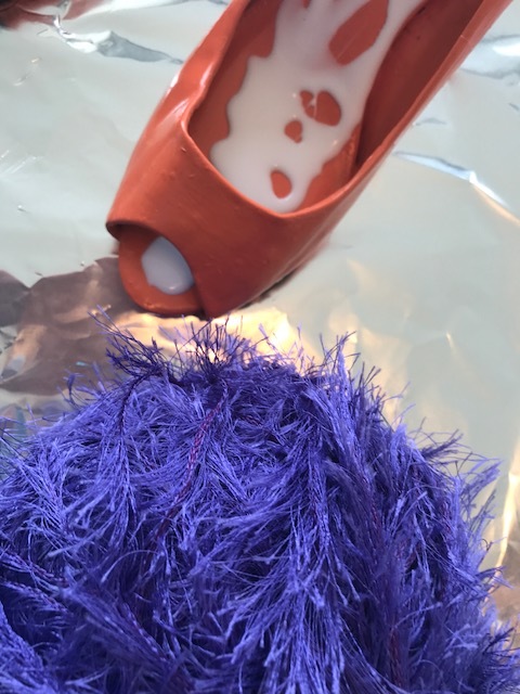 I ended up gluing three layers of yarn down into the shoe.