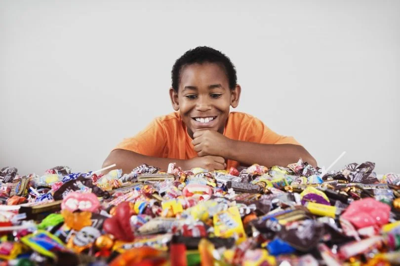 Does anyone think this kid is not going to not ALL the candy?