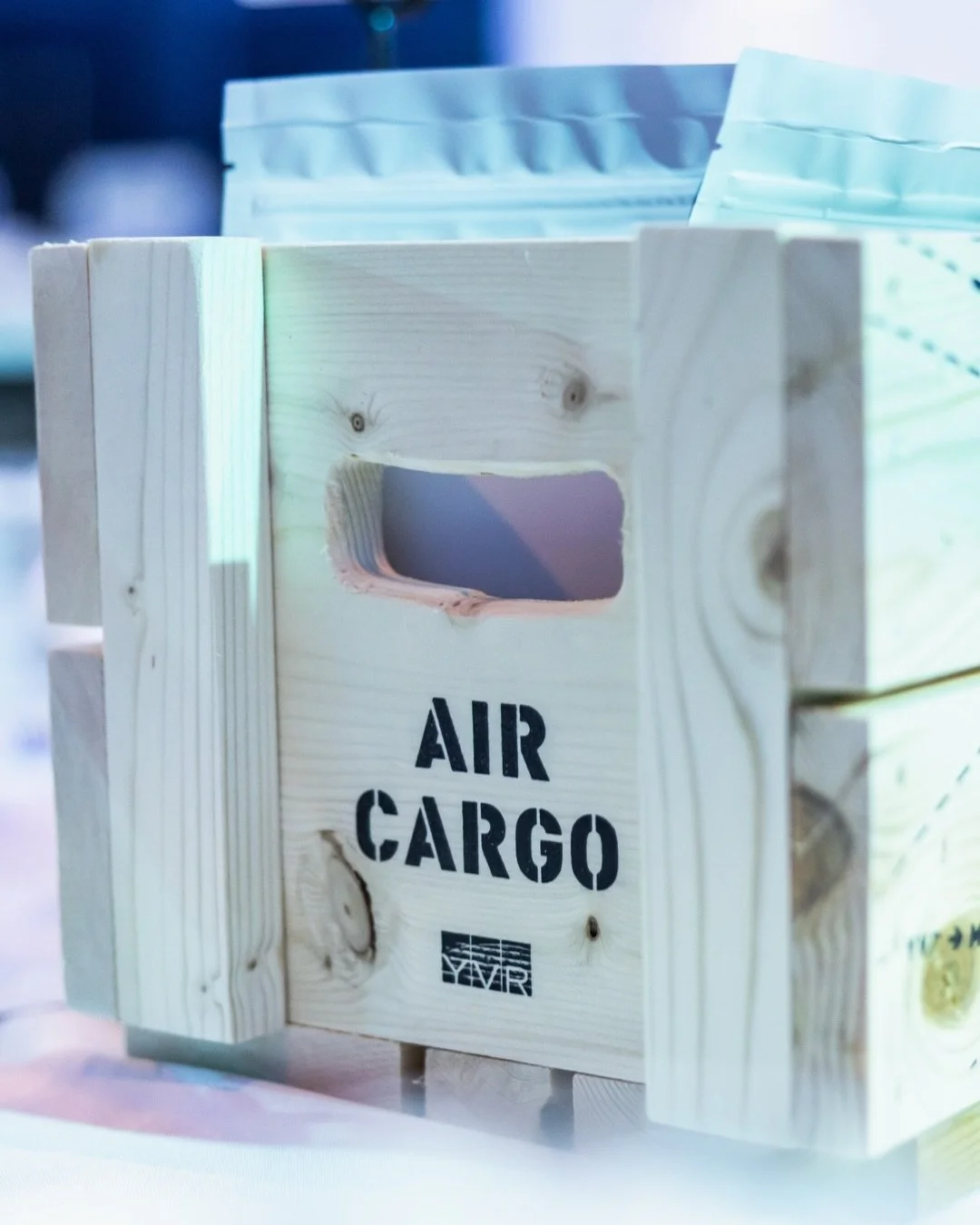 We were proud to collaborate with YVR on centrepieces for their Greater Vancouver Board of Trade keynote event last week.

Designed as wooden cargo crates highlighting key air cargo routes motifs, each featured B.C. smoked salmon, freeze-dried bluebe