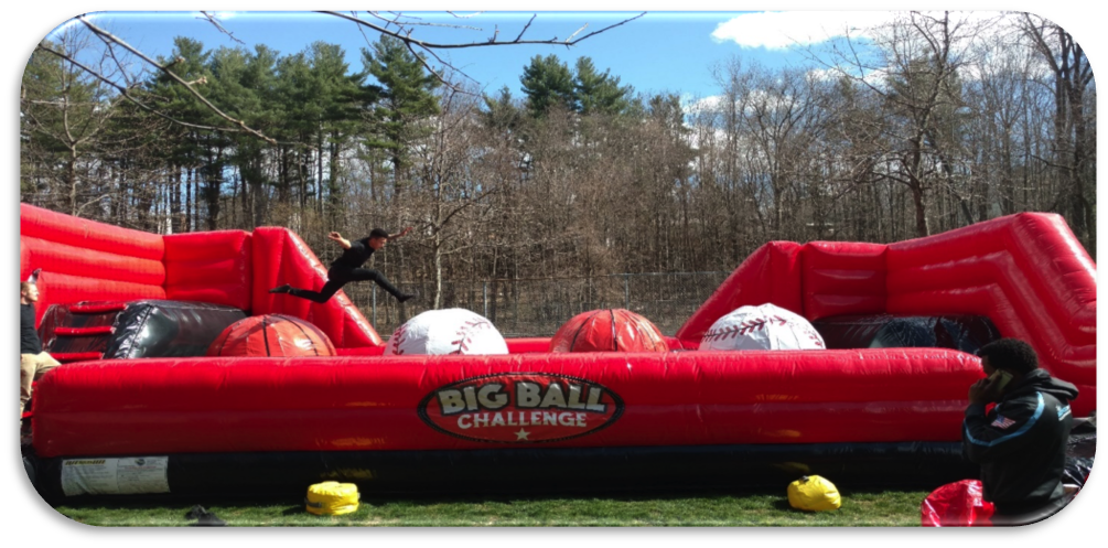 Have you ever wanted to try your Ninja or Leap frog skills? With the Leaps and Bounds interactive course you're going to get your chance. This game features a series of 4 giant inflatable balls which challengers must leap across to reach the other side. Try to cross the course by leaping from ball to ball like a frog or running across the giant balls to make it to the other side without falling. But don't worry if you fall off, the floor of the pit is protected by a super soft landing cushion with patented air bag technology. Ask about theme-ing Leaps and Bounds to fit your next sports event. We can change out the balls to reflect the sports theme of your choice. All baseballs, all soccer balls or all basketballs. People Per Hour: 75+ Power Requirement: (2) 20 AMPS Set-up Time: 1 Hour Space Required: 25’ x 15’ x 12’