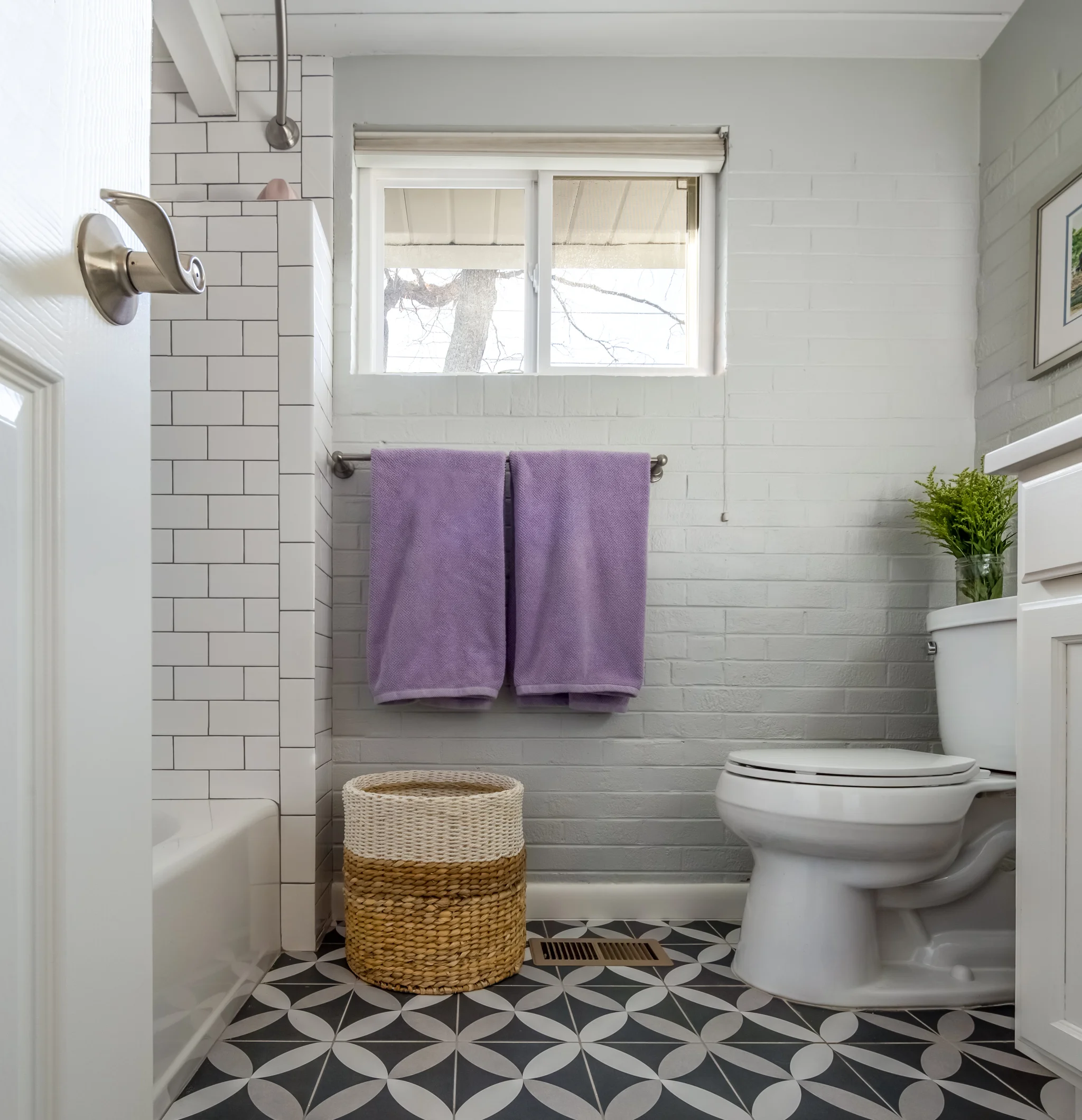 We updated the tile and paint in this bathroom off of the family room. &nbsp;Sometimes, that's all you need to do to update the look!