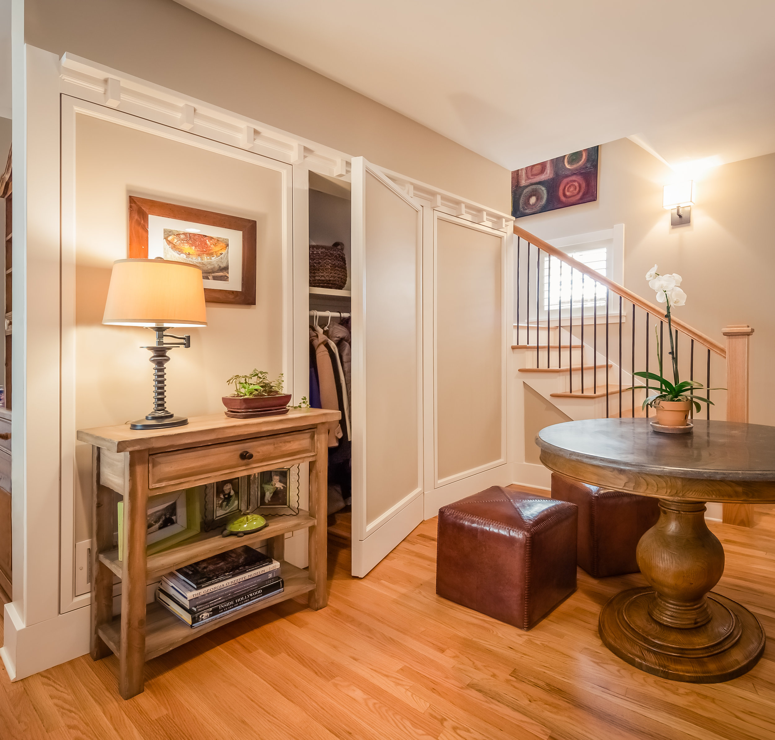A concealed door under the stairs hides a useful closet - pretty cool, right?!