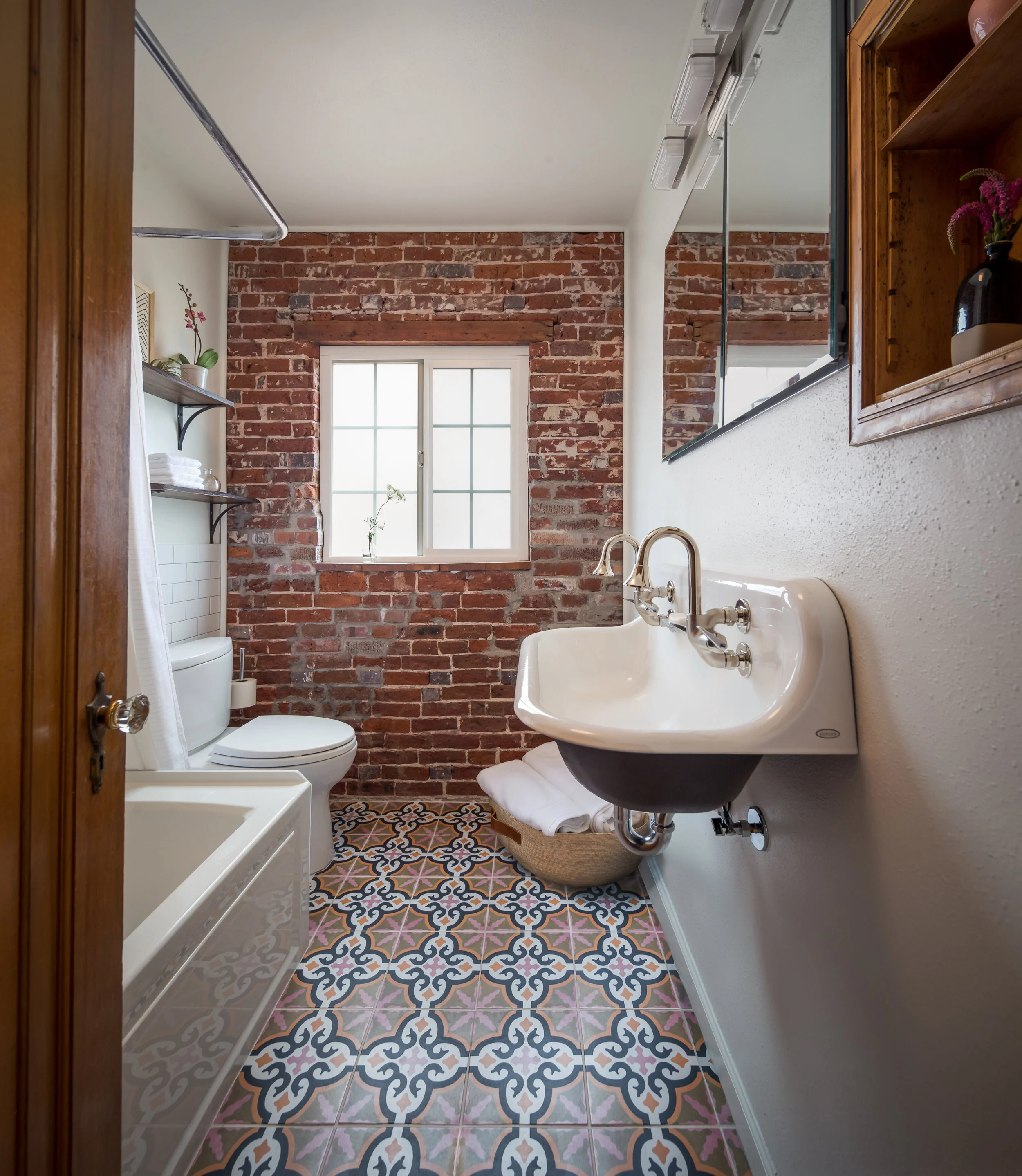 Exposed brick bathroom.jpg