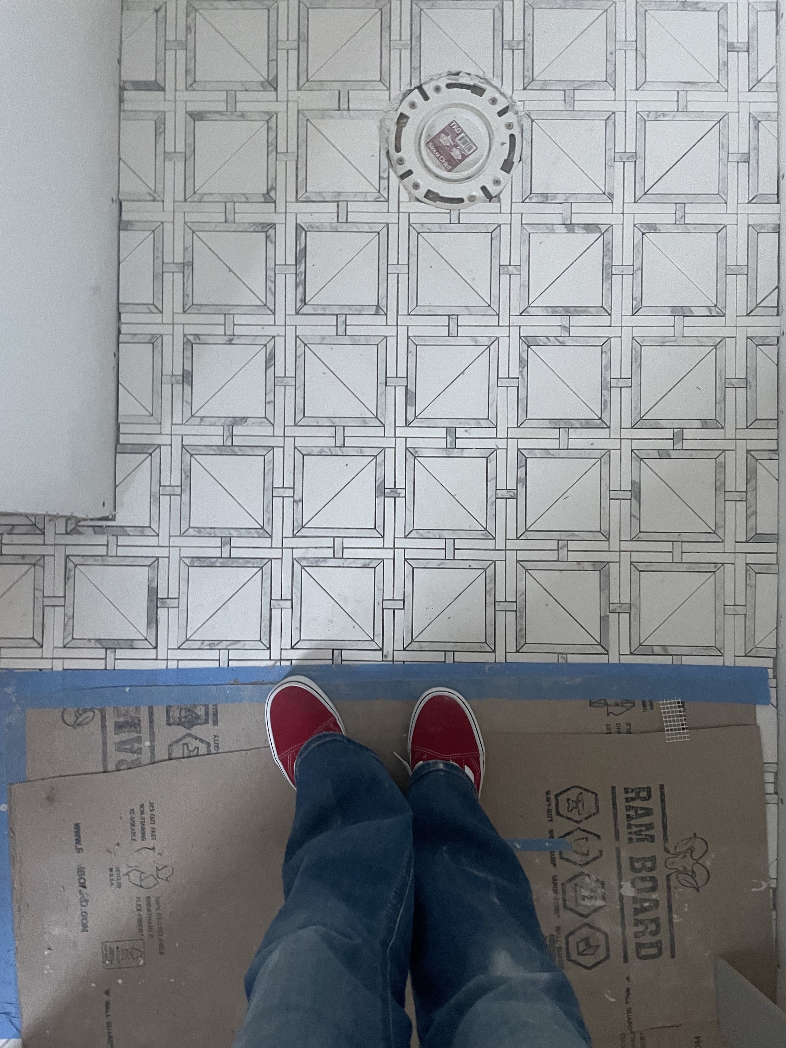 marble mosaic shower floor.jpg