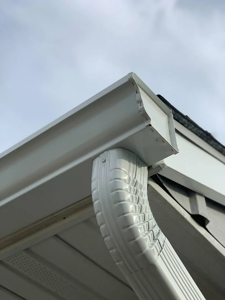 Gutters installed for an extra layer of defense against downpours!