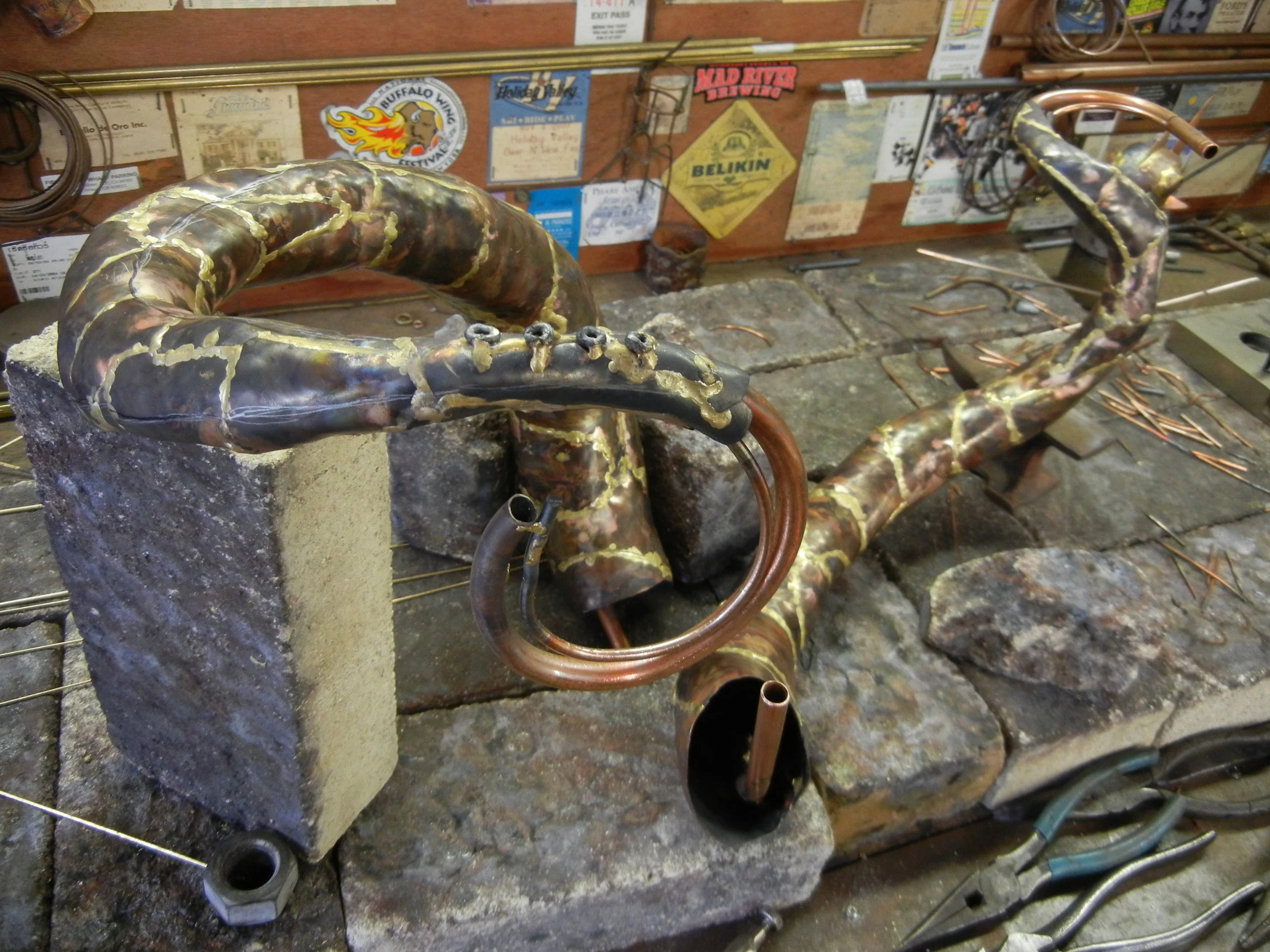  Skinning these arms have been a huge challenge to say the least. Octo's have tappering arms so I need to apply that. Working outward I cut out small steel rod and free form the copper no easy task. Have I learned something? "Oh heck ya" 