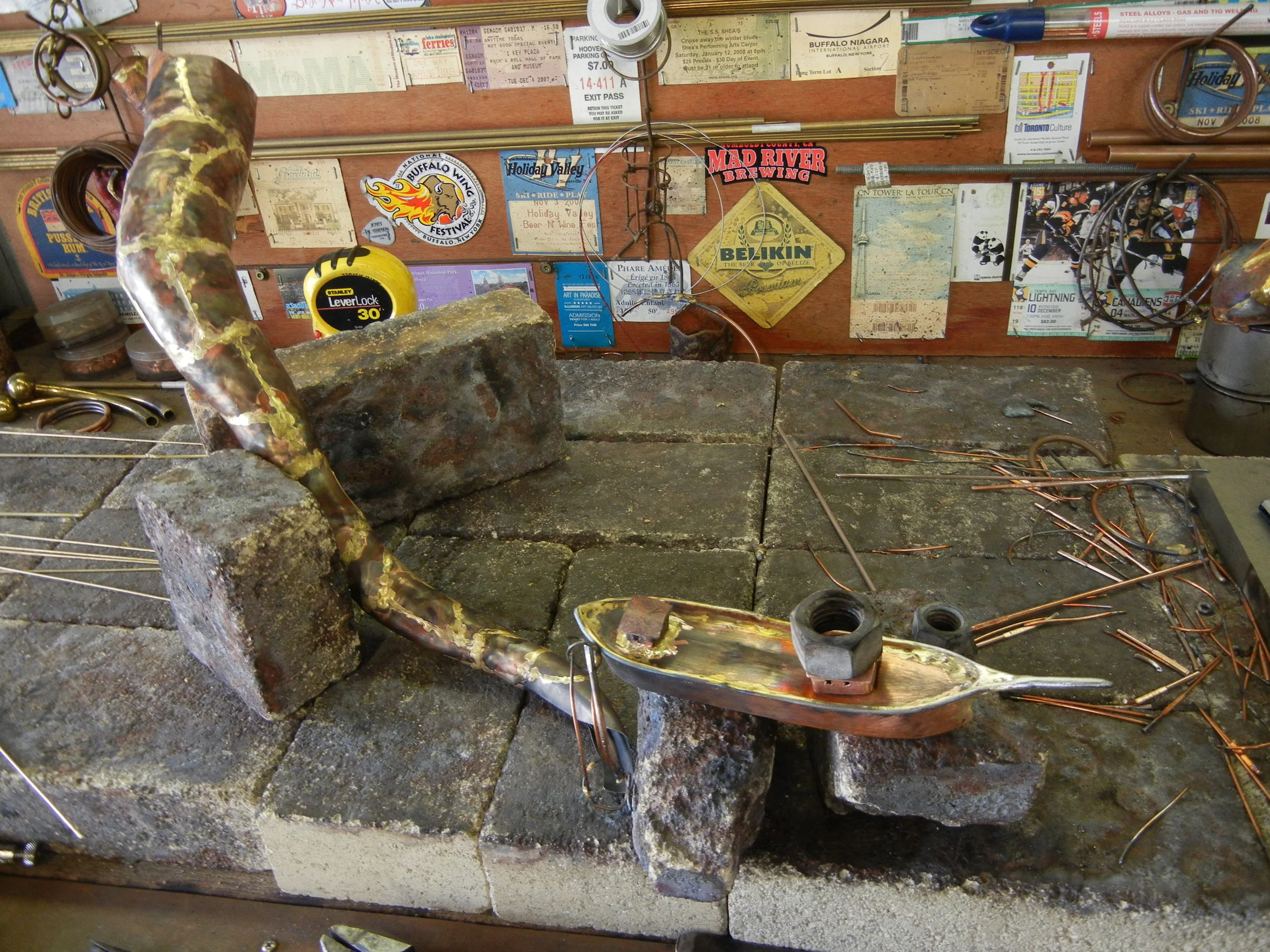  Here I'm working on the arm and ship at the same time. Do hot work on one piece let cool move onto next weld. Repeat till done. 