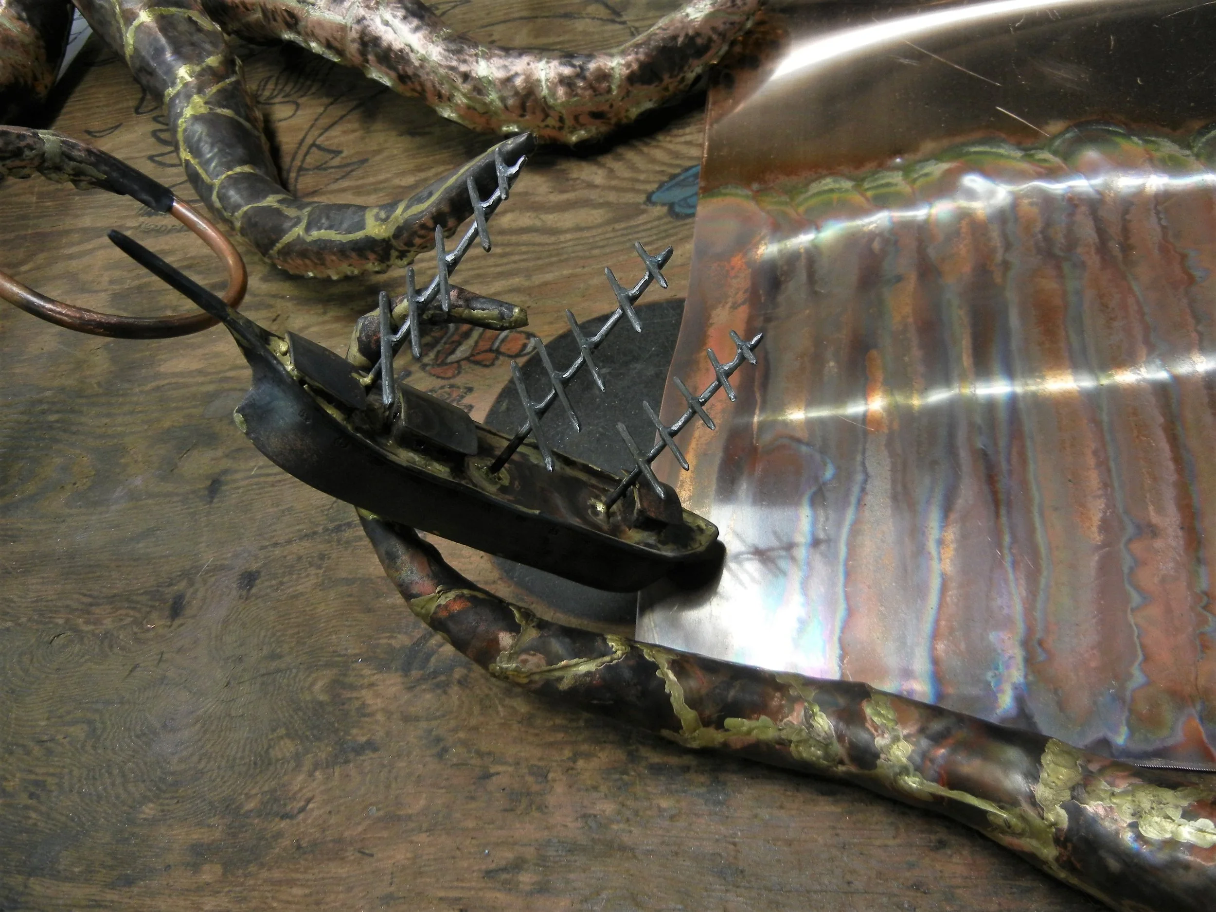  Arm holding ship something like this? 