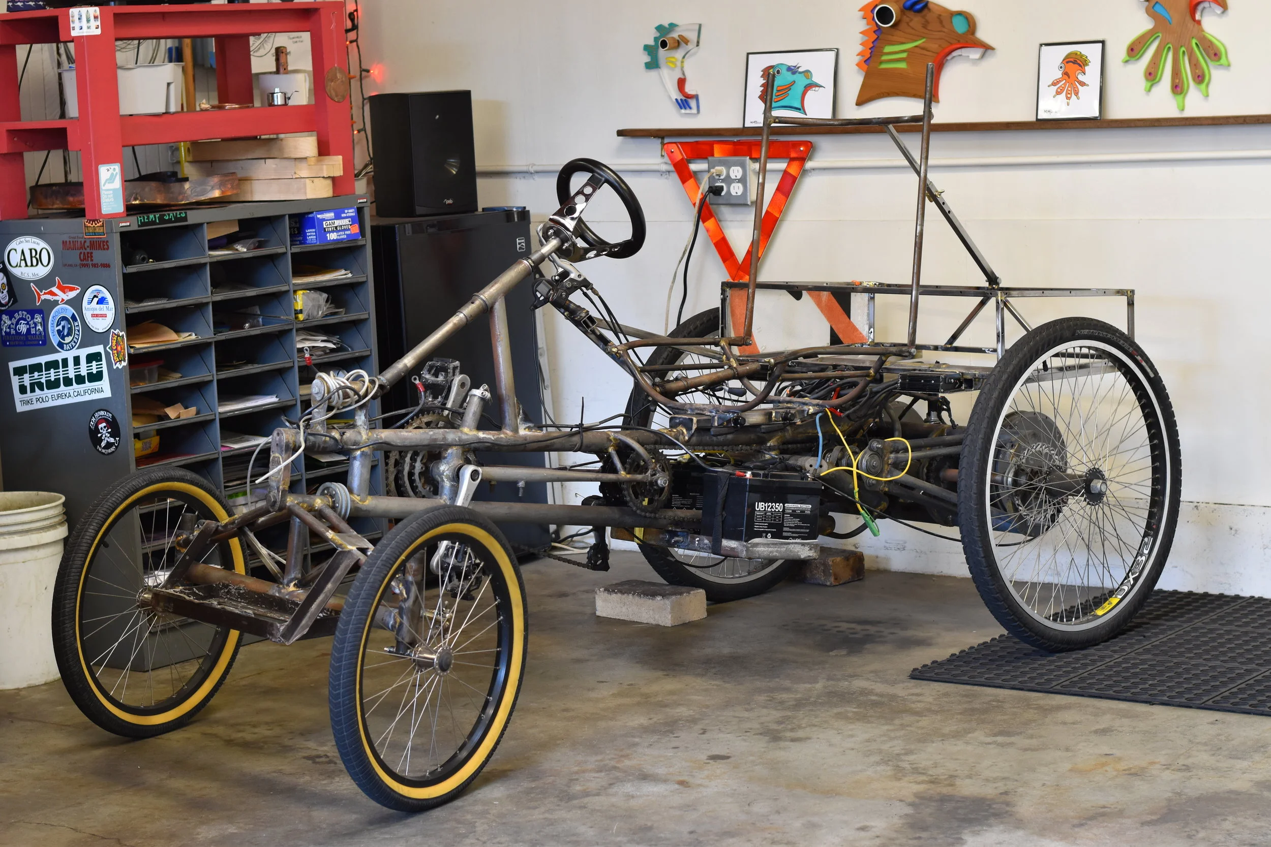  Decided on a new ‘lectric toy, original chassis built by a friend who in turn sold to me May 2018. So far I’ve rebuilt the front end, steering, throttle, brake and shifting handles. Built box for carrying beer and groceries. Build continues and has 