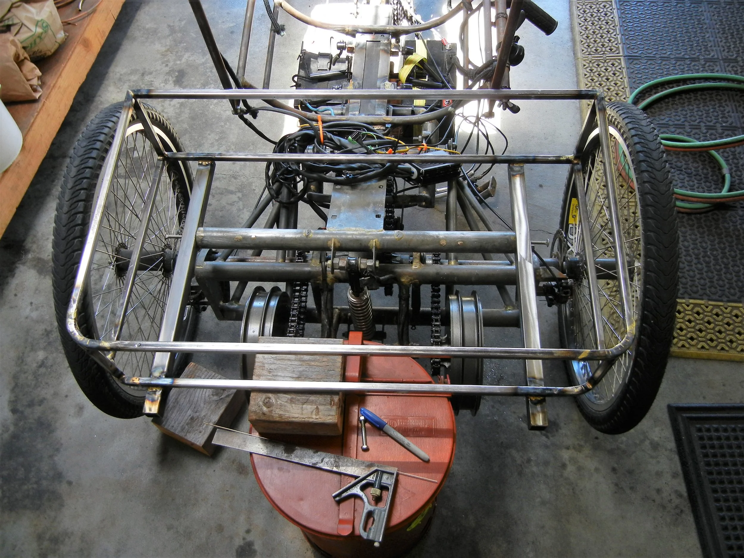  Objective - Not to weld to existing frame as much as possible. Here I’m working on my grocery/beer carrier, will bolt on for easy removal and maintaining. 