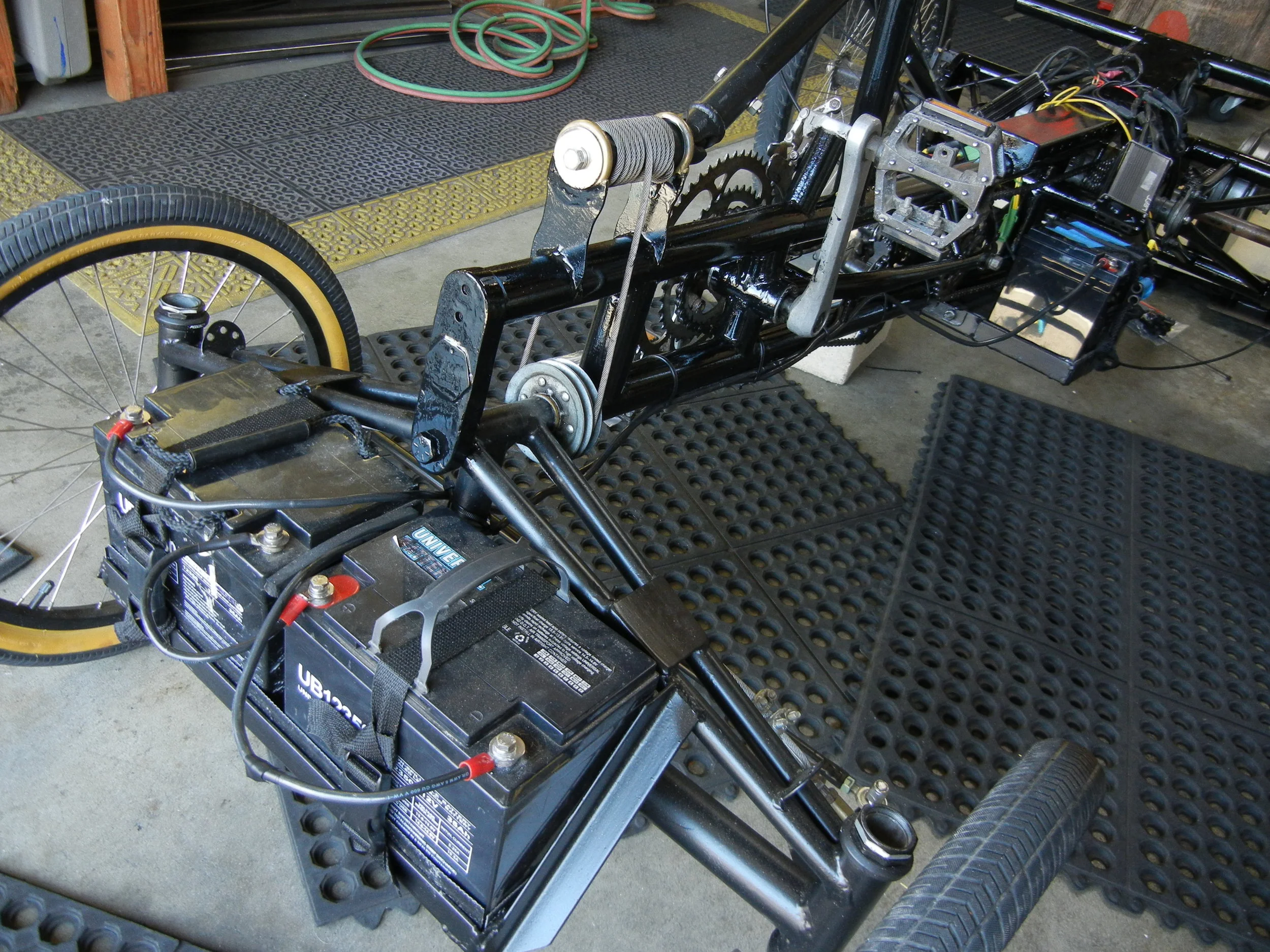  Steering cable, check. Heli-copter hoist cable approved, check. Re-built front end no suspension bumpy as all get out, check. Things I’ve learned on this build, make it straight, offset where needed and make shit happen. Steers better than most cars