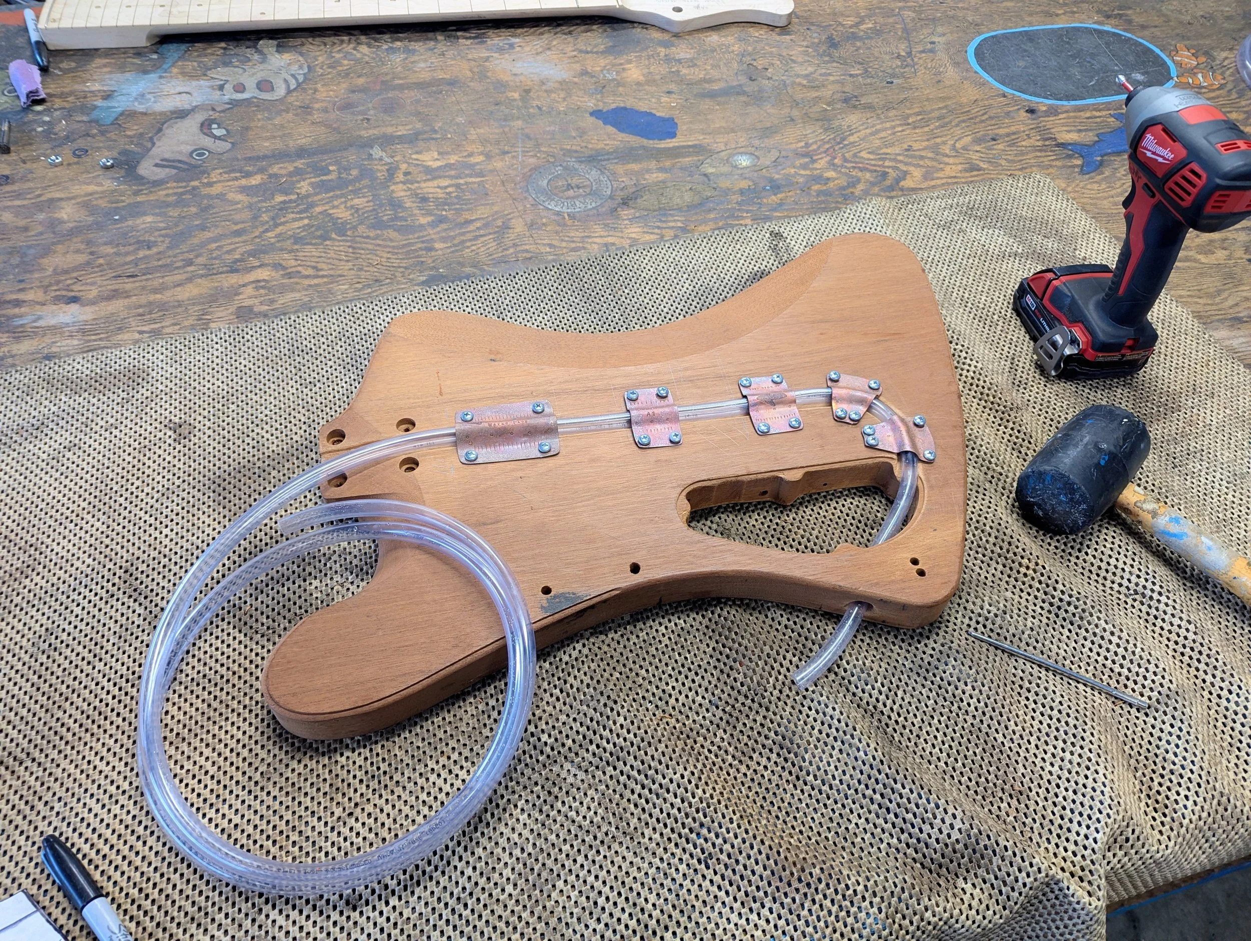 Here I routed out a water line groove backside of body, each copper bracket labeled appropriately
