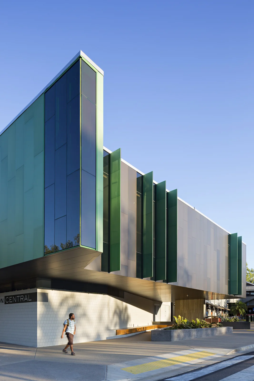 A minimally glazed and well shaded western facade reduces heat-gain to the upper level classrooms. A lantern projects toward the street as a key landmark along the heavily treed campus ring road. This glass lantern with its integrated photovoltaics powers its illumination at night. 