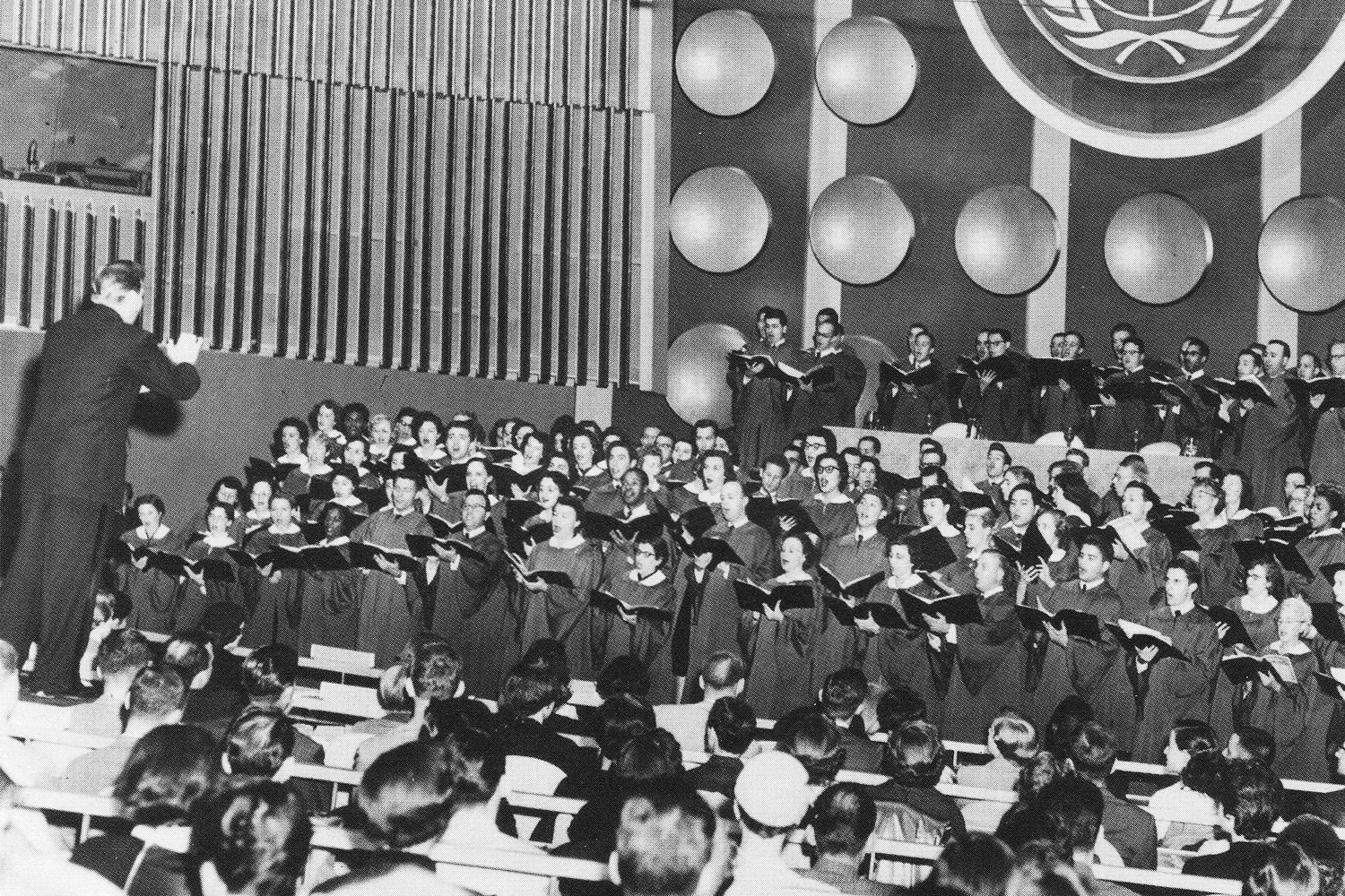 Robert Shaw conducts the Collegiate Chorale at the first session in the United Nations building, 1953.