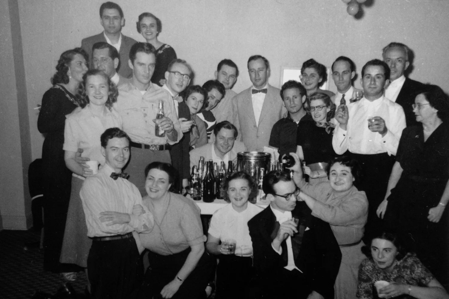 Shaw on the road with members of the Robert Shaw Chorale during an after performance party.