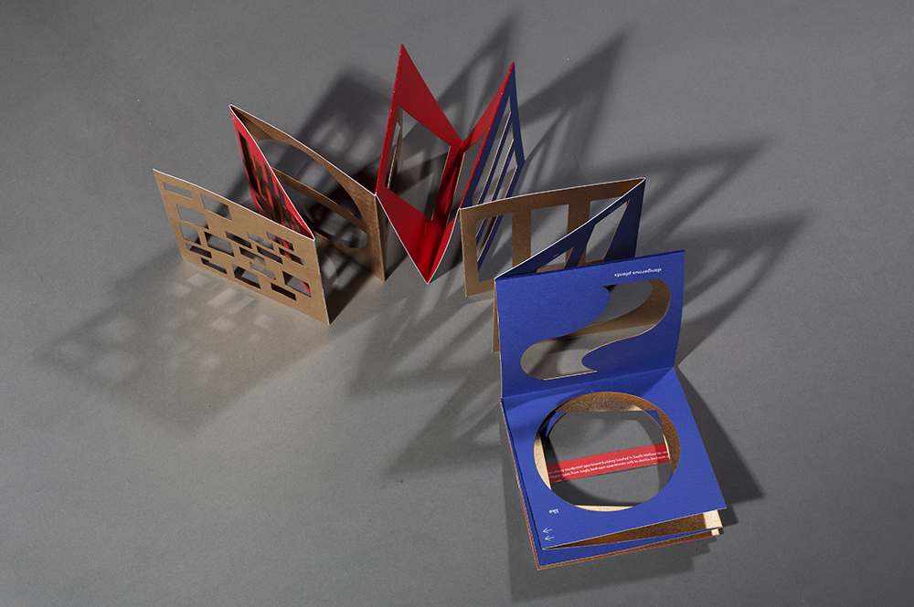 Gold was chosen for the 'exterior' of the publication, red and blue for the 'interior' to reflect ORBIS's colors. 