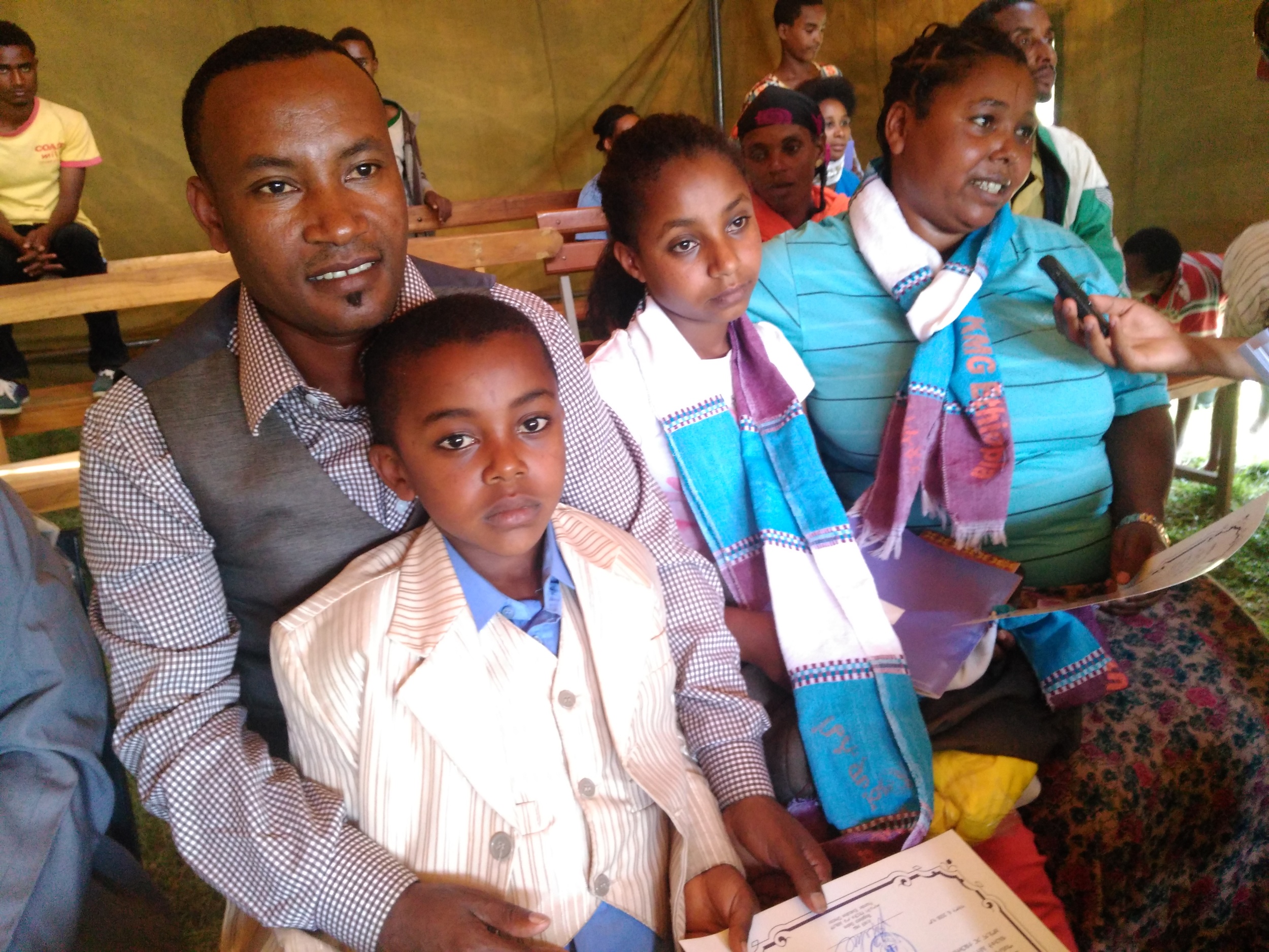 Addise and Genet with their 2 Children