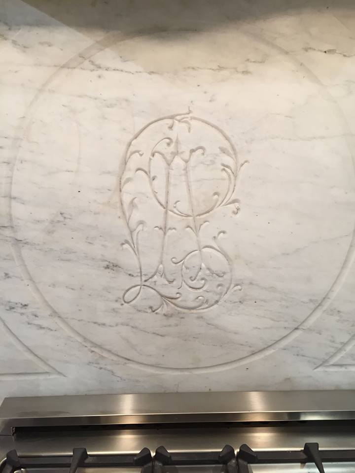 This piece of antique marble was spotted at market used as a backsplash in the kitchen of the fabulous new showroom, Eloquence, located on Wrenn Street. I'm in love with this carved design!