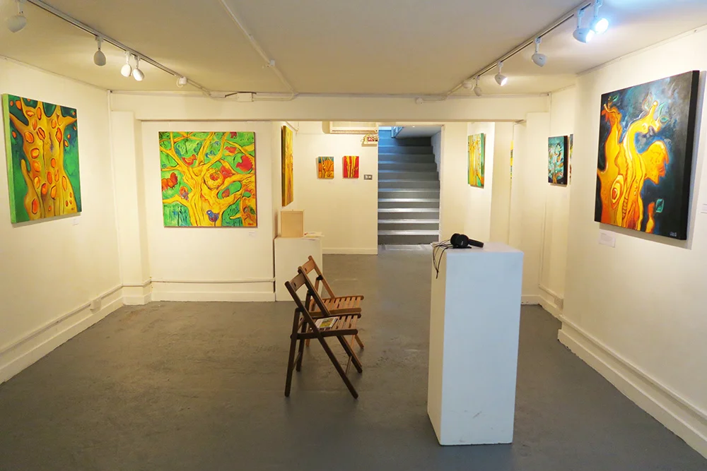 Downstairs at Colour Connect. Some works were accompanied by poetry.