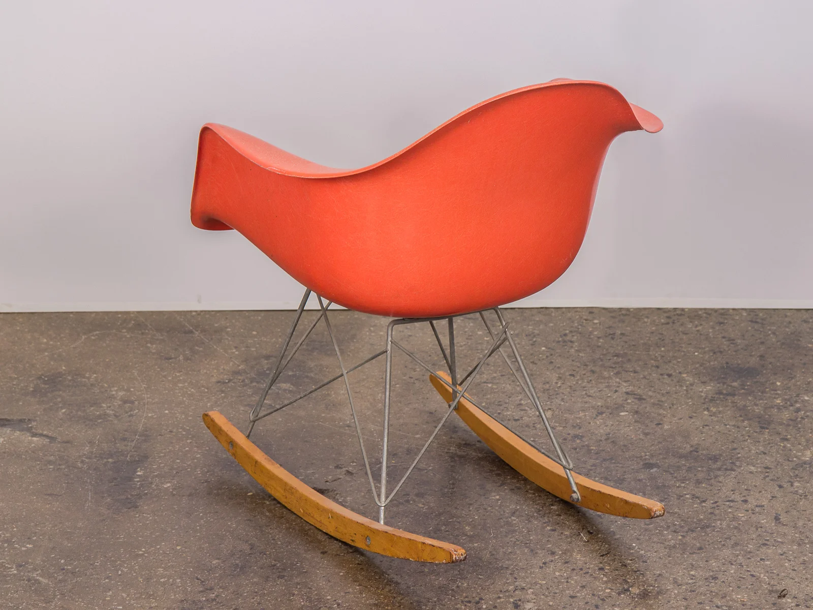 open_air_modern_eames_orange_fiberglass_armchair_shell_on_rocker_base_herman_miller-5.jpg