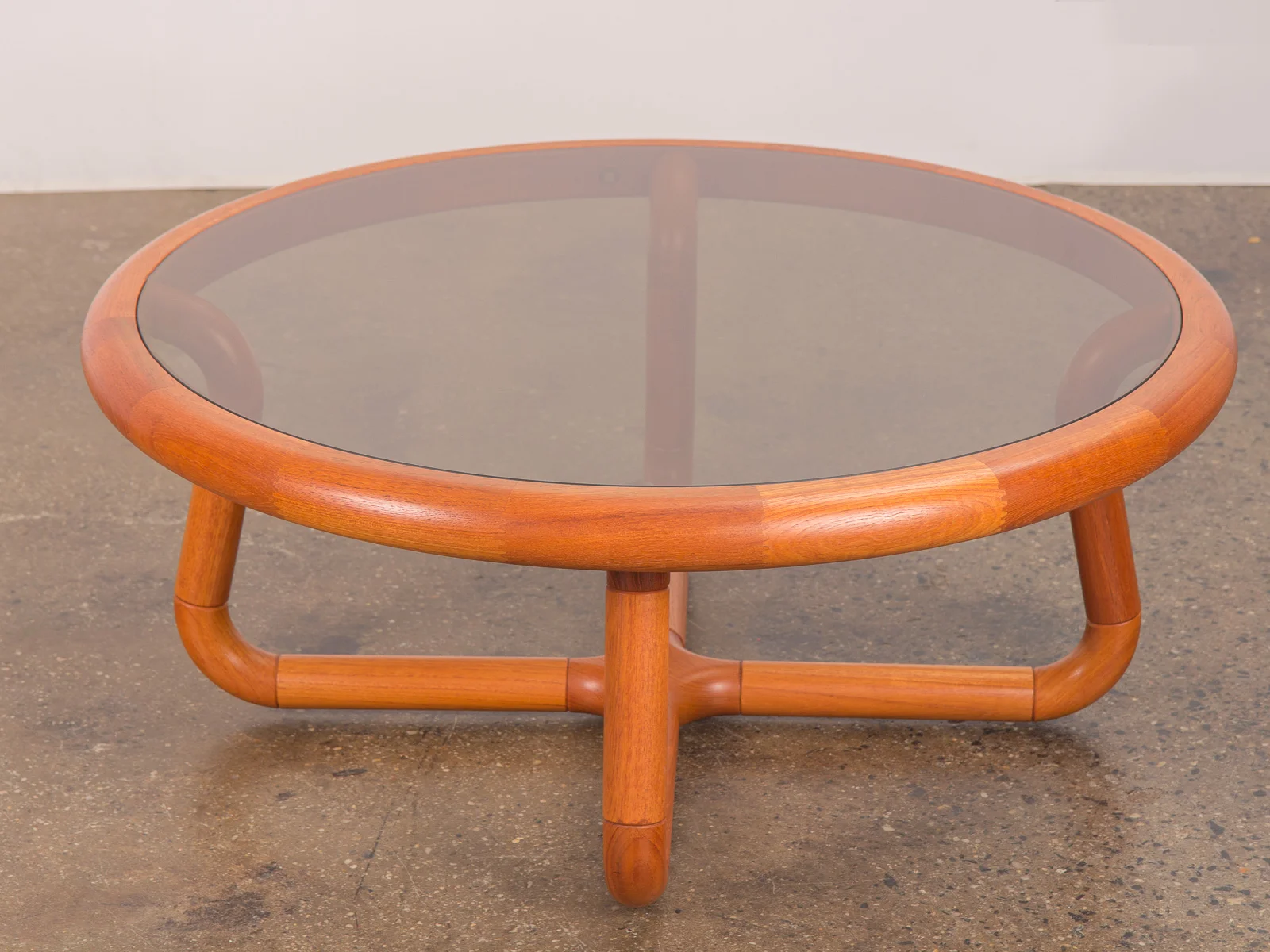 open_air_modern_scandinavian_danish_uldum_mobelfabrik_sculptural_curved_smoky_glass_coffee_table-2.jpg