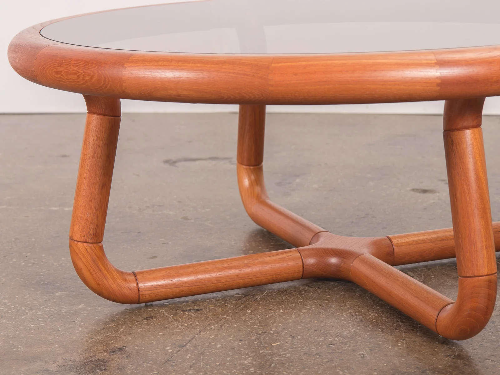open_air_modern_scandinavian_danish_uldum_mobelfabrik_sculptural_curved_smoky_glass_coffee_table-7.jpg