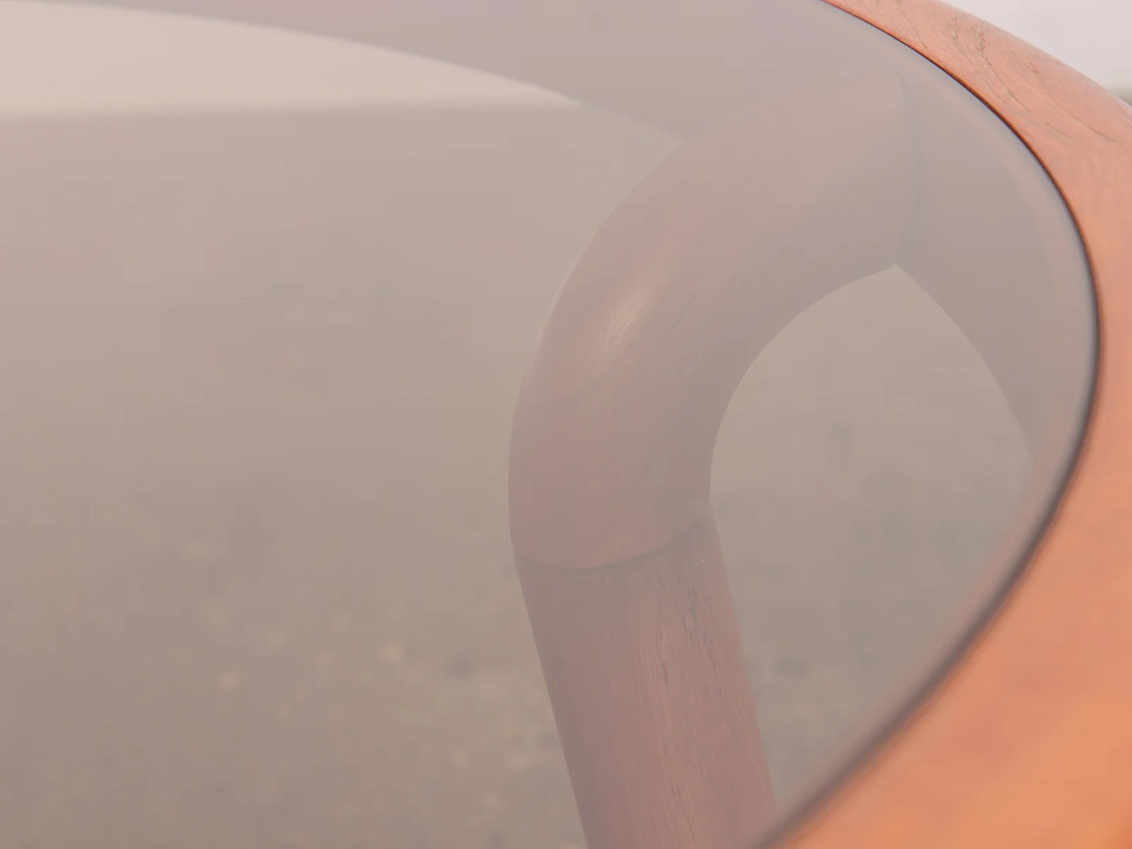 open_air_modern_scandinavian_danish_uldum_mobelfabrik_sculptural_curved_smoky_glass_coffee_table-8.jpg