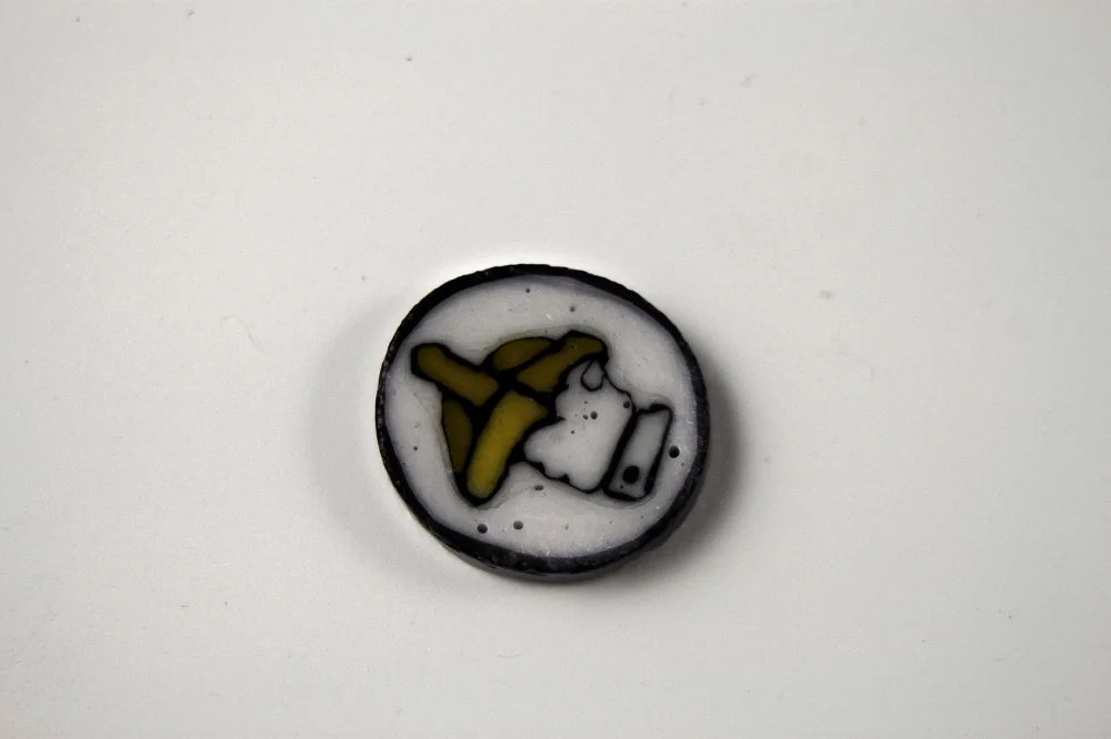 Tipitian's Bananna Hand Murinne Polished Coin