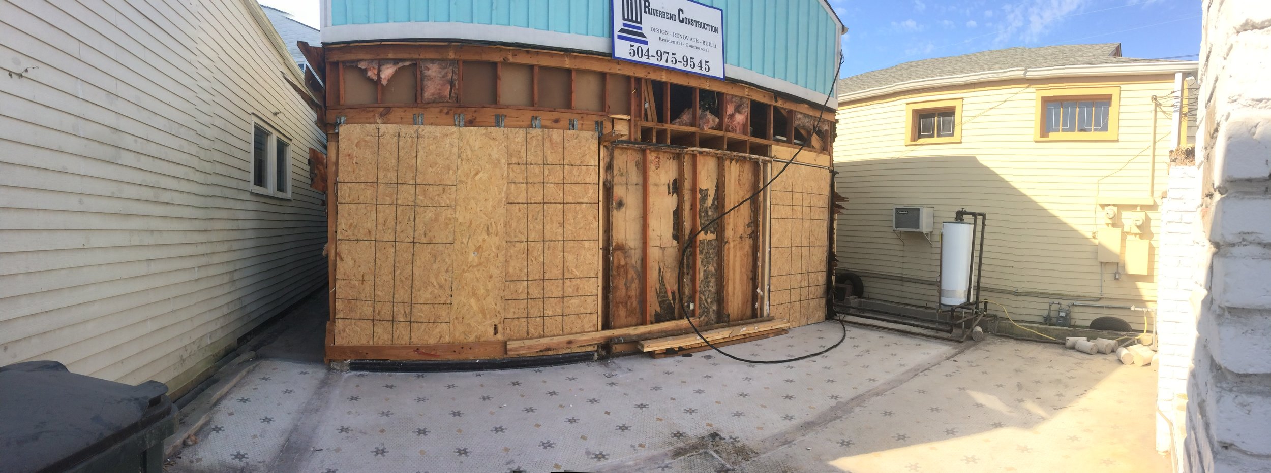 The front and the back of the building have been removed to make room for a new storefront and offices/classroom in the back. 